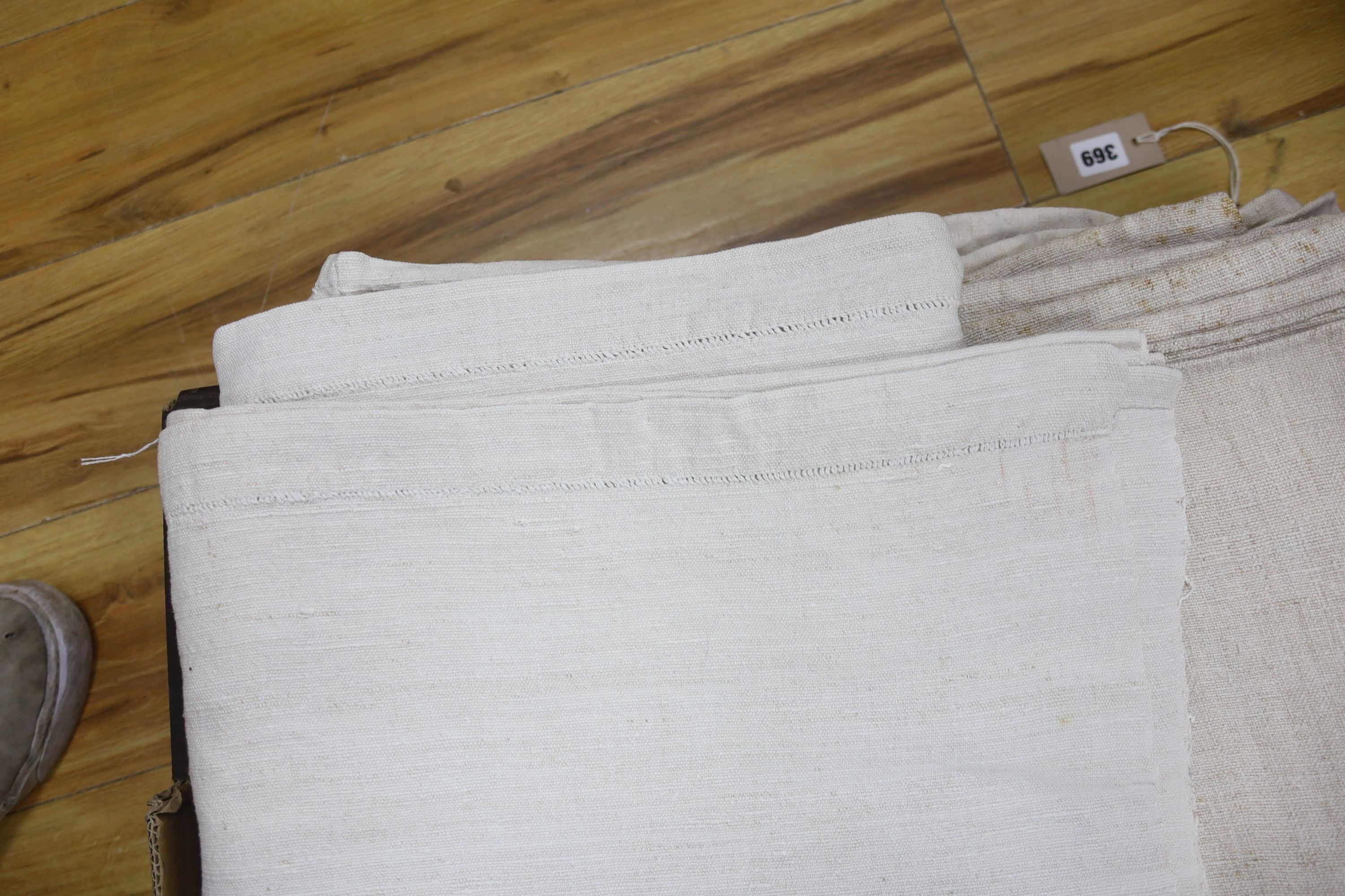 A collection of coarse French provincial linen sheets